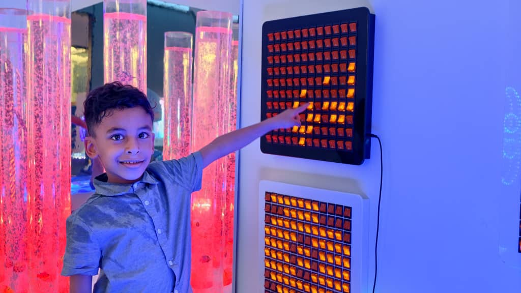 Sensory light panel with buttons